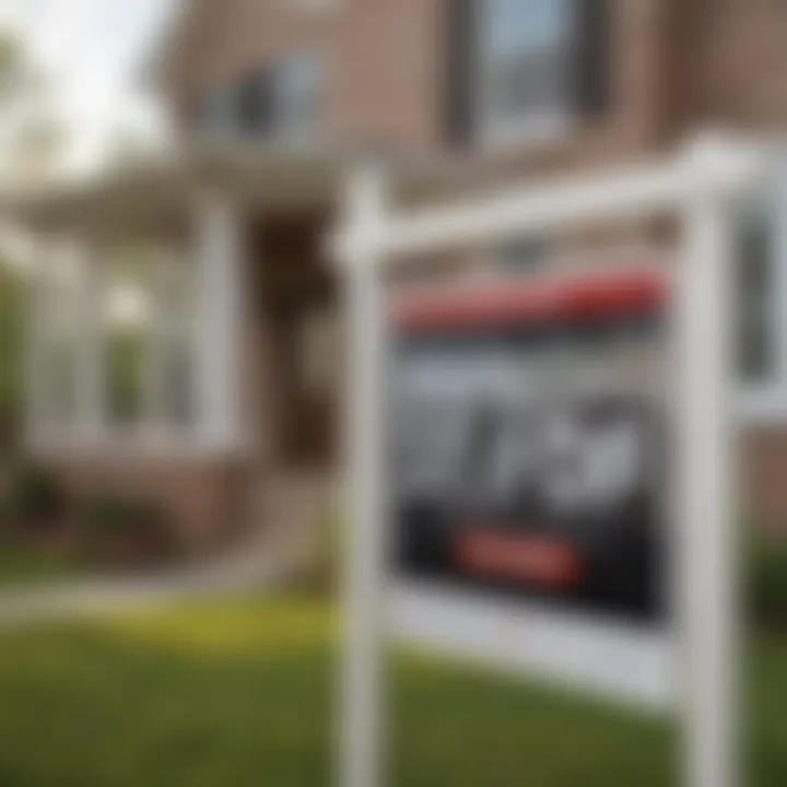 Close-up of a 'For Sale' sign in front of a house