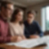 A thoughtful couple reviewing financial documents related to home purchasing.