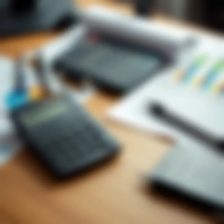 A calculator and financial documents on a desk